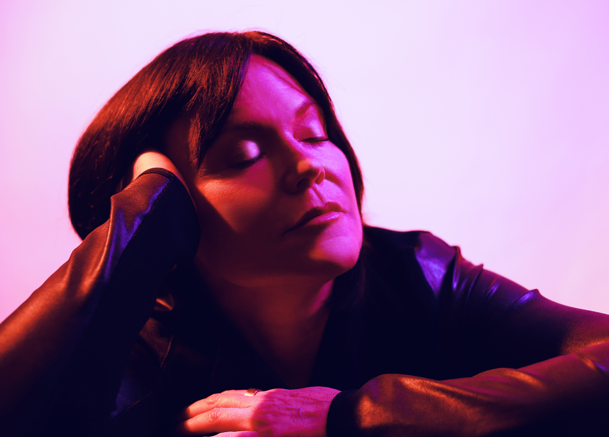 Shell Robinson portrait in purple and pink lighting
