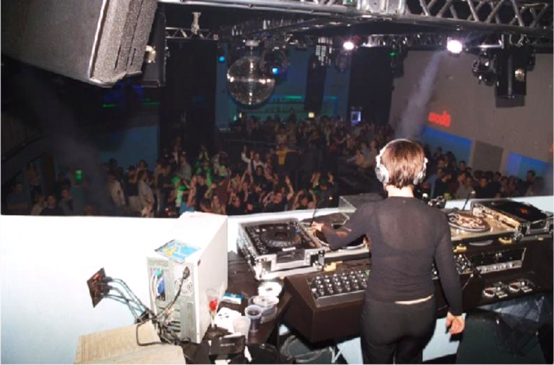 Shell Robinson DJing with crowd in background